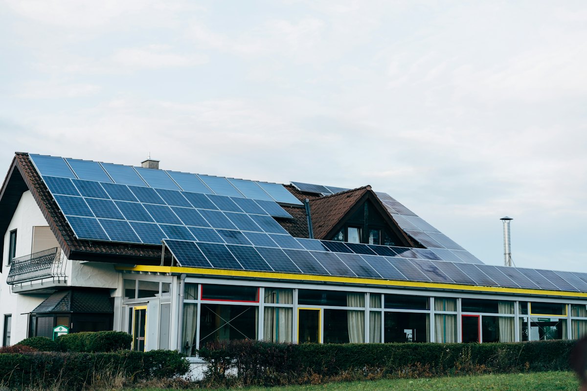 House with a full solar panel array across its roof