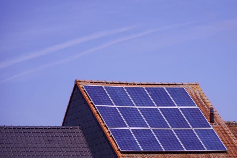 Close-up of solar panels on a tiled rooftop